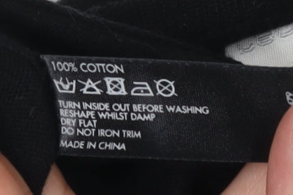 Brand and care label for Red Herring Women's Black Cardigan 4, Button Accent, Casual