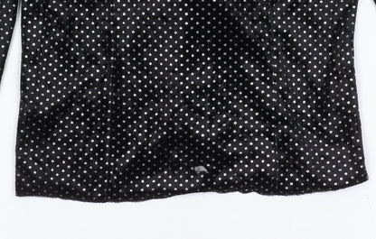 Close-up detail of C&A Women's Black Polka Dot V-Neck Top, size 10