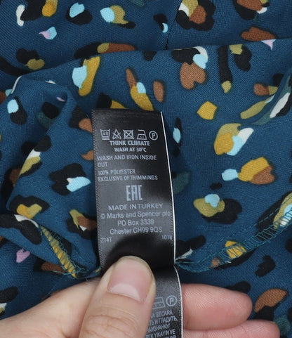 Close-up detail of Marks & Spencer Blue Animal Print Button-Up Shirt