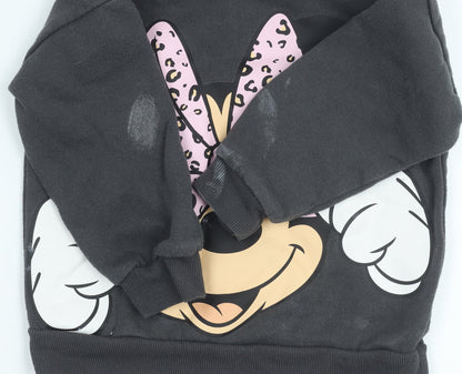 Close-up detail of Disney at Primark girls’ black minnie mouse sweatshirt 3-4y
