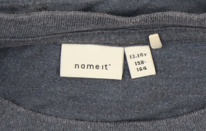 Close-up detail of NAME IT girls’ blue floral pullover sweatshirt - 13-14 years