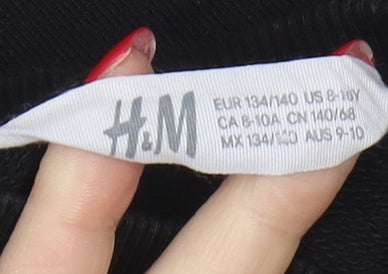 Brand and care label for H&M boys’ black space explorer sweatshirt 10 years