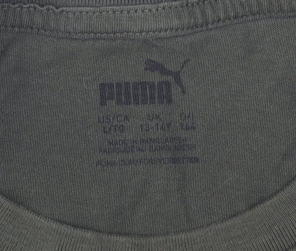 Close-up detail of Puma boys’ green t-shirt, size L, basic logo style