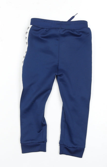 Back view of Adidas boys’ blue track pants 3 years regular fit
