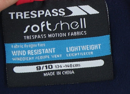 Close-up detail of Trespass girls’ red soft shell jacket 9-10 years