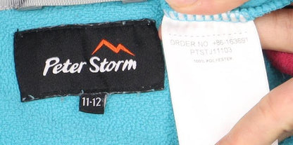 Close-up detail of Peter Storm girls’ blue pullover fleece sweatshirt 11 years