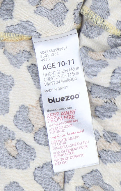 Close-up detail of Bluezoo girls’ multicoloured animal print dress 10-11 years