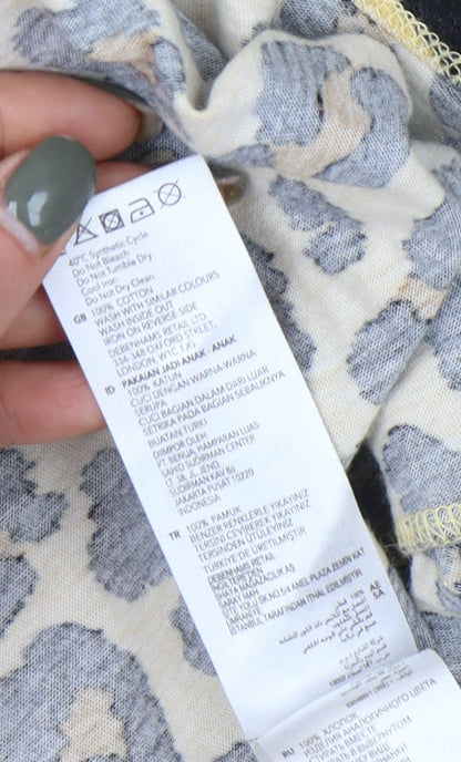 Brand and care label for Bluezoo girls’ multicoloured animal print dress 10-11 years