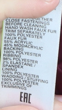 Brand and care label for Marks & Spencer girls’ red puffer jacket 12-13 years