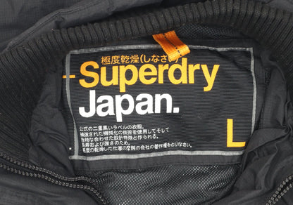 Close-up detail of Superdry boys’ black nylon jacket l long sleeve zip