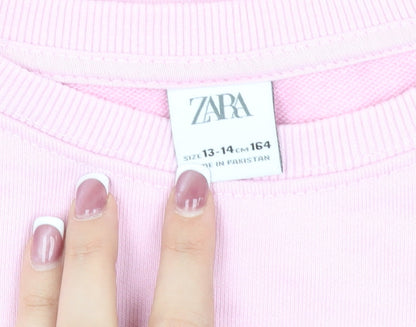 Close-up detail of Zara girls’ pink pullover sweatshirt 13-14 years crew neck