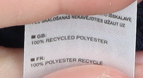 Close-up detail of Trespass boys’ blue jacket, eco-friendly, 9-10 years