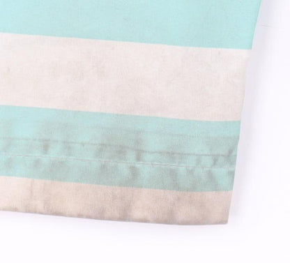 Close-up detail of Regatta girls’ blue striped rain coat, 8 years