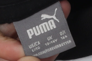 Close-up detail of Puma boys’ black hoodie pullover, size 13, graphic logo