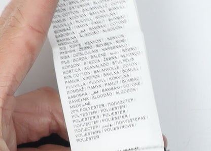 Brand and care label for Puma boys’ black graphic t-shirt 13-14 years
