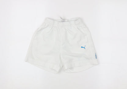 Back view of Puma boys’' white athletic shorts, size 8, quick dry activewear