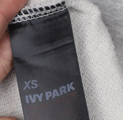 Close-up detail of Ivy Park Women's Grey XS Pullover Hoodie