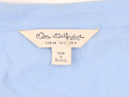 Close-up detail of Miss Selfridge Women's Blue V-Neck Short Sleeve Top