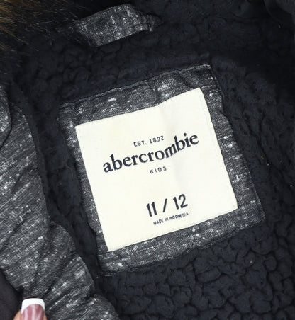 Close-up detail of Abercrombie & Fitch boys’ grey puffer jacket 11-12 years winter hooded