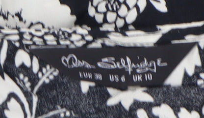 Brand and care label for Miss Selfridge Women's Black Floral Top, size 10