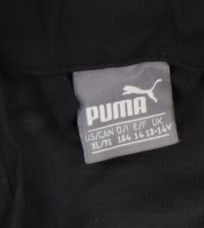 Close-up detail of Puma boys’ black track jacket, size 14