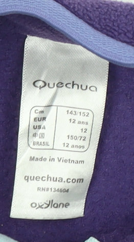 Close-up detail of Quechua girls’ purple blue fleece jacket, size 14, years