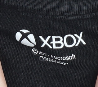 Close-up detail of XBOX boys’ black pullover hoodie 9-10 years gaming logo
