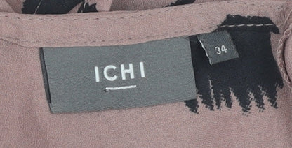 Close-up detail of ICHI Women's Brown Polka Dot Blouse, size 6