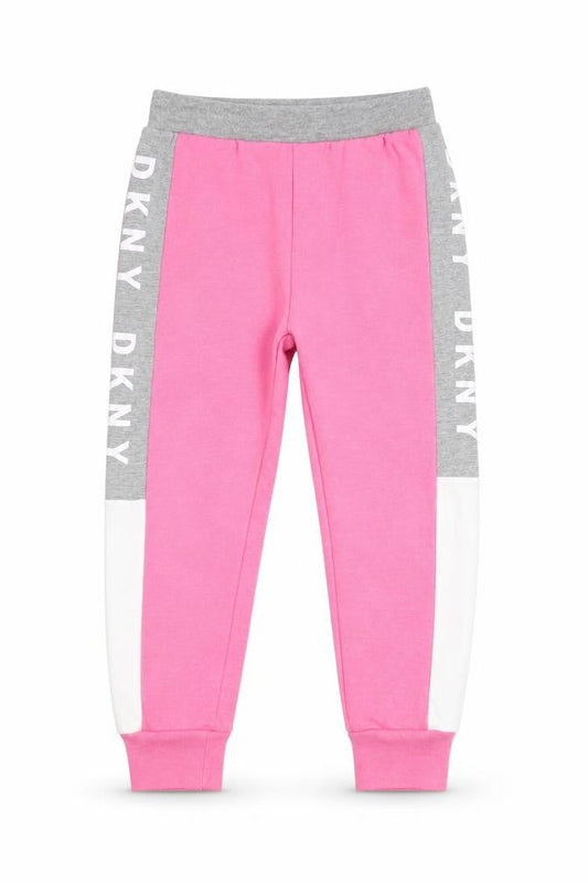 Front view of DKNY girls’ pink jogger trousers, size 5, elastic waist