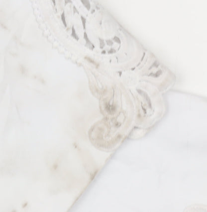 Brand and care label for Roman Women's White Lace Accented Cotton Trousers