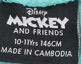 Close-up detail of Disney girls’ green mickey tracksuit 10-11 years casual fleece