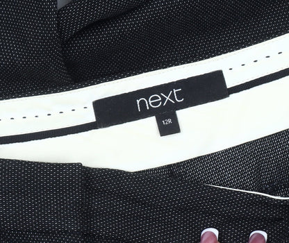 Close-up detail of Next women’s black regular fit trousers, size UK 12
