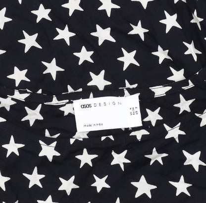Close-up detail of ASOS DESIGN Women's Black Star Pattern Tank Blouse, size 4