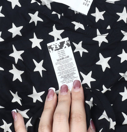 Brand and care label for ASOS DESIGN Women's Black Star Pattern Tank Blouse, size 4