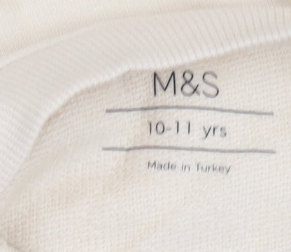 Brand and care label for Marks & Spencer girls’ beige pullover sweatshirt 10-11 years