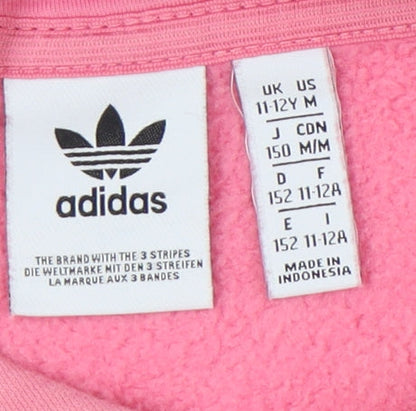 Close-up detail of Adidas girls’ pink hoodie pullover 11-12 years logo sports