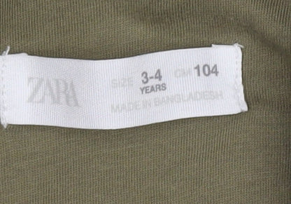 Brand and care label for Zara boys’ green quilted jacket 3-4 years