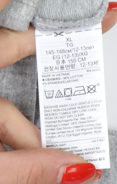 Brand and care label for Gap girls’ grey xl leggings, cotton elastane blend