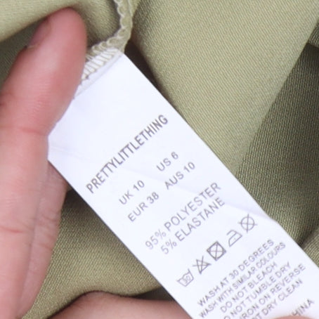 PrettyLittleThing Women's Green Flared Trousers Size 10