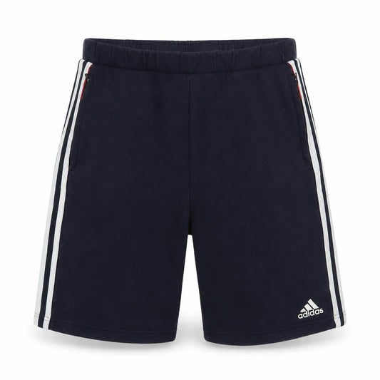 Front view of Adidas boys’ blue athletic shorts 16y elastic waist