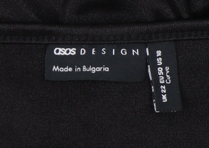 Close-up detail of ASOS DESIGN Women's Black Plus Wrap Blouse, size 22
