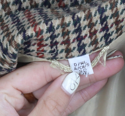 Close-up detail of C&A Women's Multicoloured Houndstooth Blazer, size 10