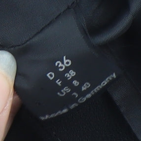 Close-up detail of Ella Singh Women's Black Cropped Suit Jacket, size 8