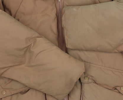 Close-up detail of Missguided Women's Beige Puffer Jacket, size 10