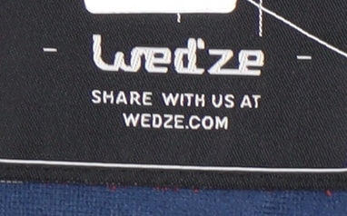 Close-up detail of Wedze boys’ green puffer jacket - 10 years