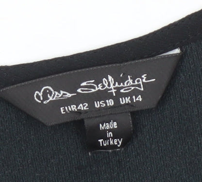 Brand and care label for Miss Selfridge Women's Black Floral Wrap Blouse, size 14