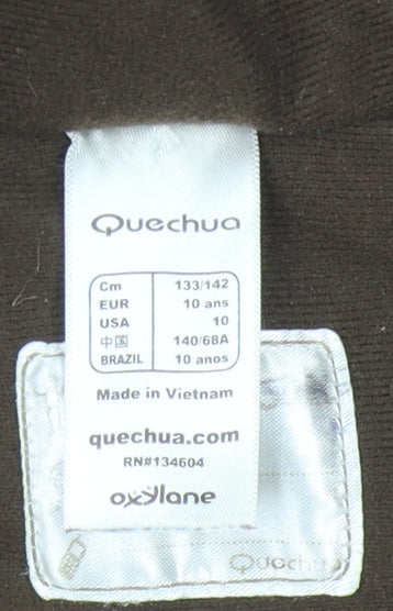 Close-up detail of Quechua boys’ green hooded puffer jacket, size 10-11, years