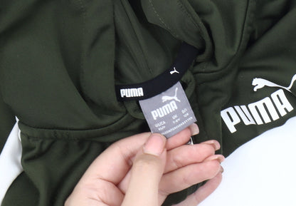 Close-up detail of Puma boys’ green hooded track jacket, size 4