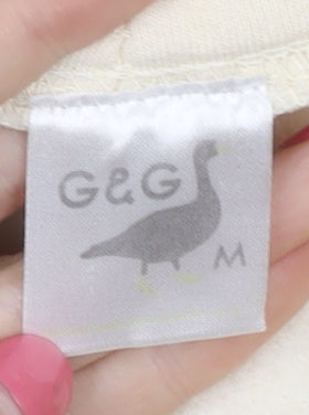 Brand and care label for G&G Men's Ivory Hoodie - Medium, Pullover
