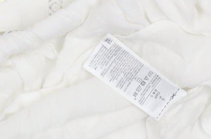 Close-up detail of Marks & Spencer White V-Neck Crochet Blouse, S